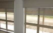 Двойные рулонные шторы на пластиковые окна